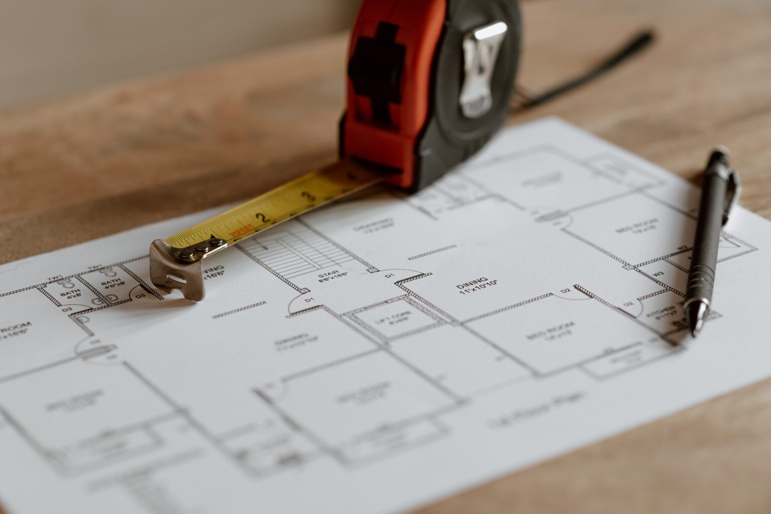 building permit process Vancouver construction plans and tape measure