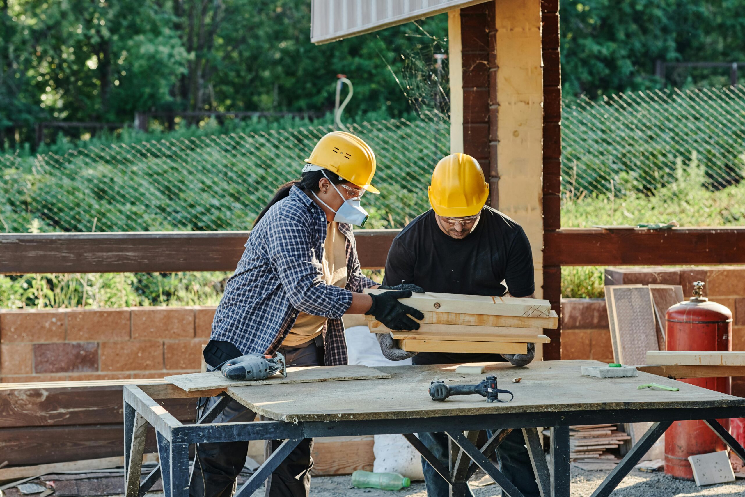 Trades working on custom home framing during the construction phase of a residential build in Vancouver.