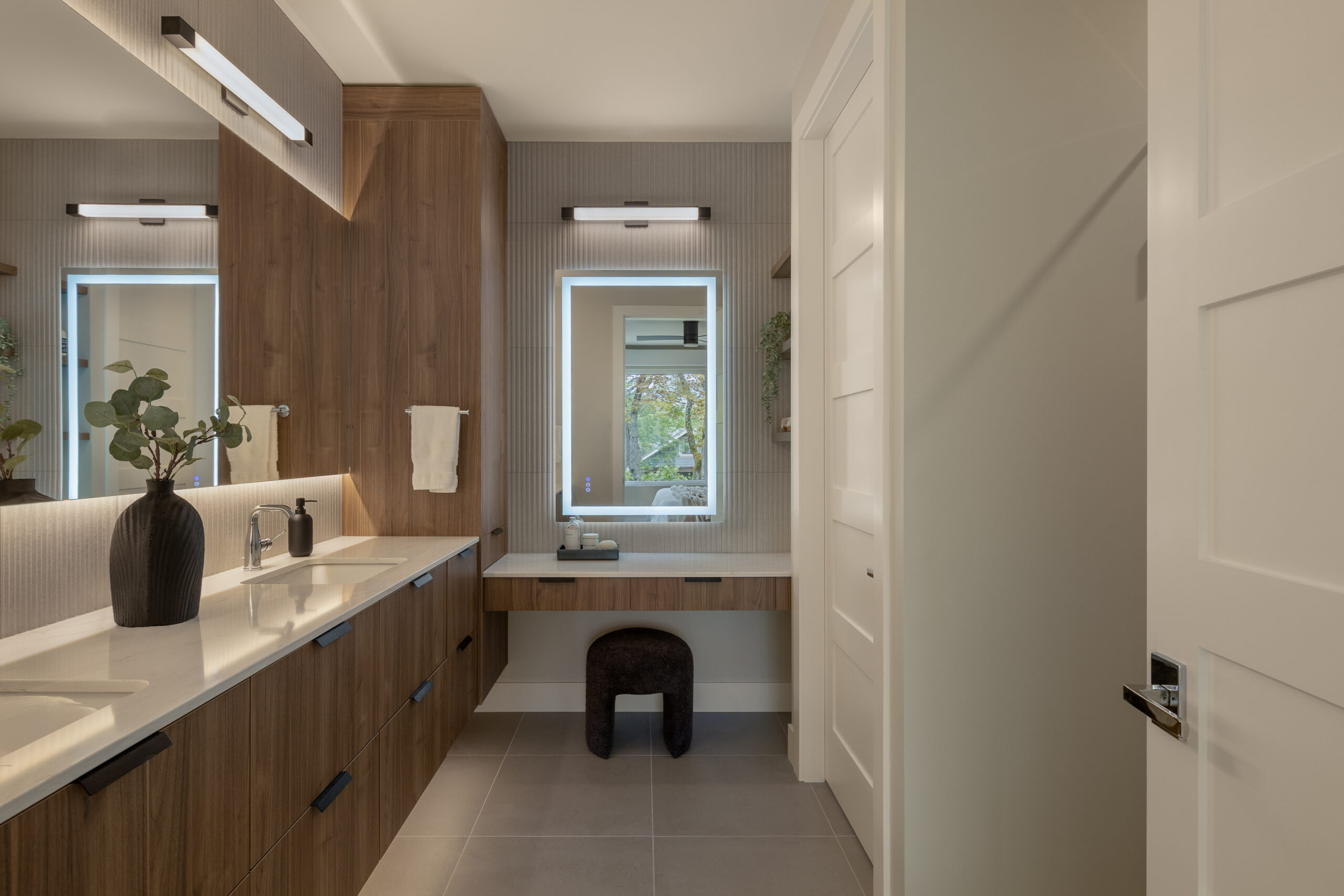 Vancouver bathroom renovation with custom vanity, modern lighting, and warm wood finishes